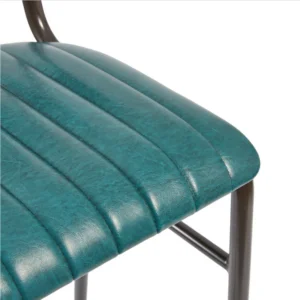 Vintage Bar Stool in Teal showing faux leather seat pad